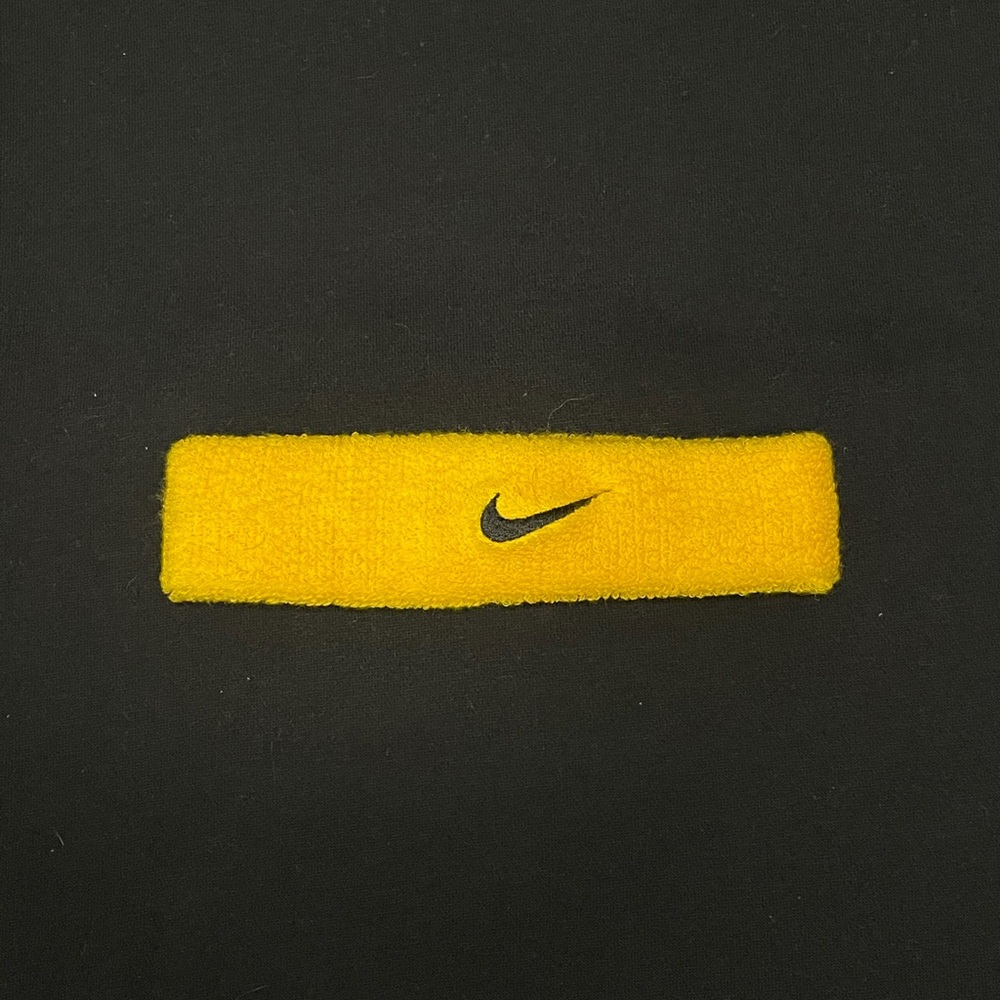 Nike yellow and black sweatband/headband